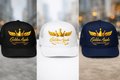 Golden Apple Connections Elite black foam trucker hat with mesh back and metallic gold crown and wing logo